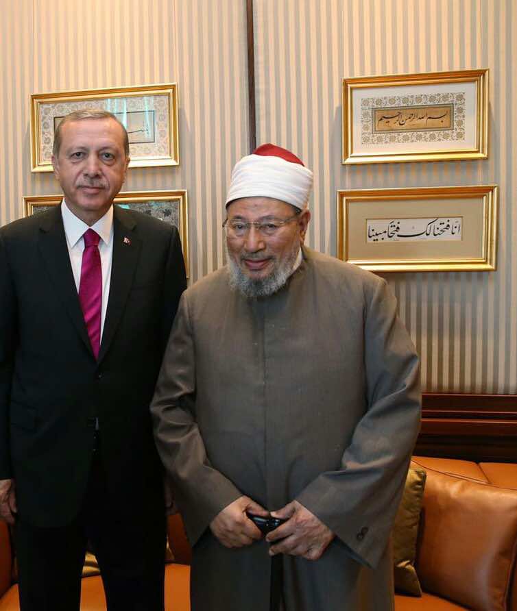 القرضاوي لأردوغان: الله والملائكة وجبريل معك - فيديو