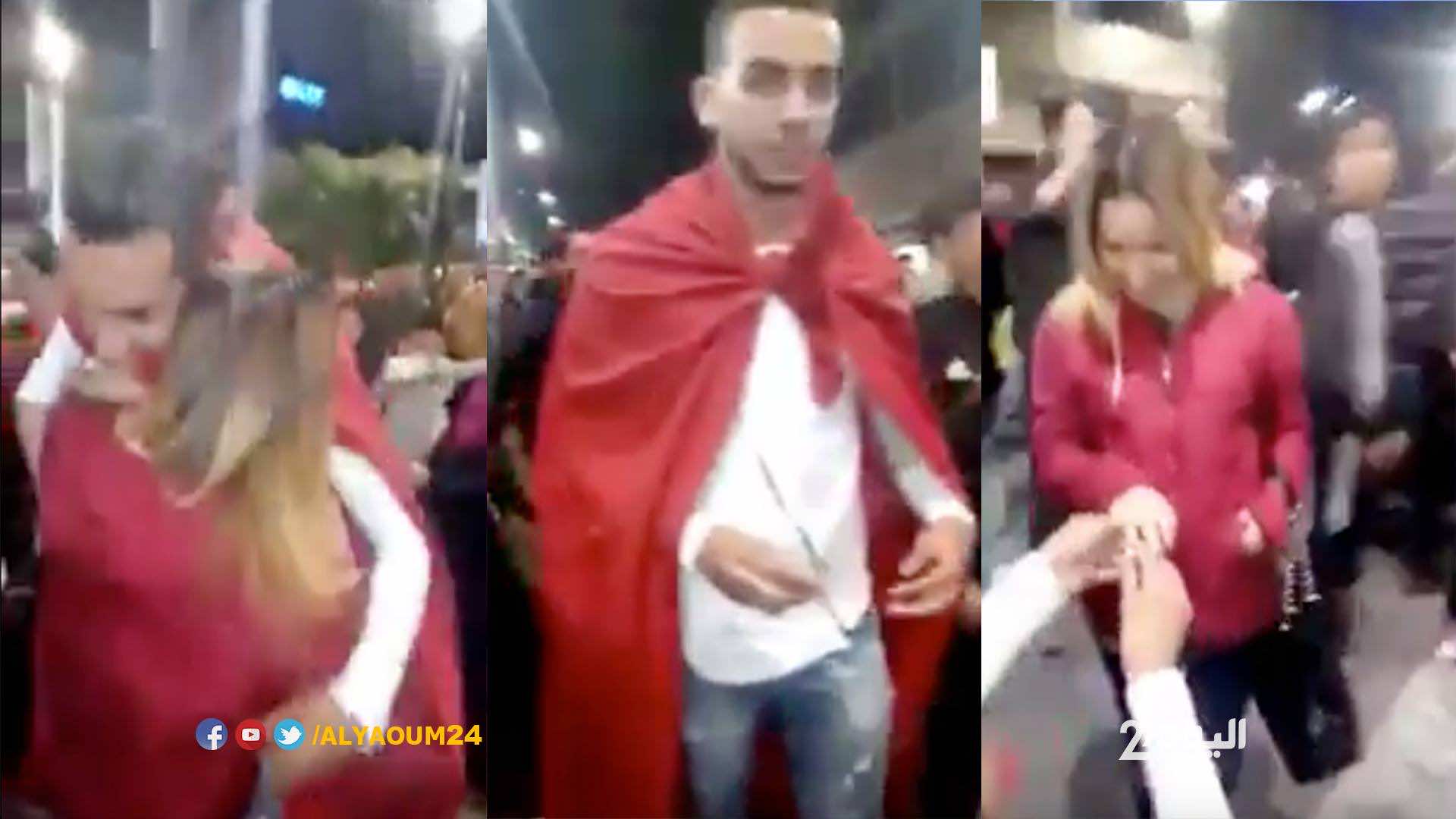 شاب مغربي يستغل احتفالات تأهل المنتخب ويتقدم بطلب زواج من صديقته - فيديو
