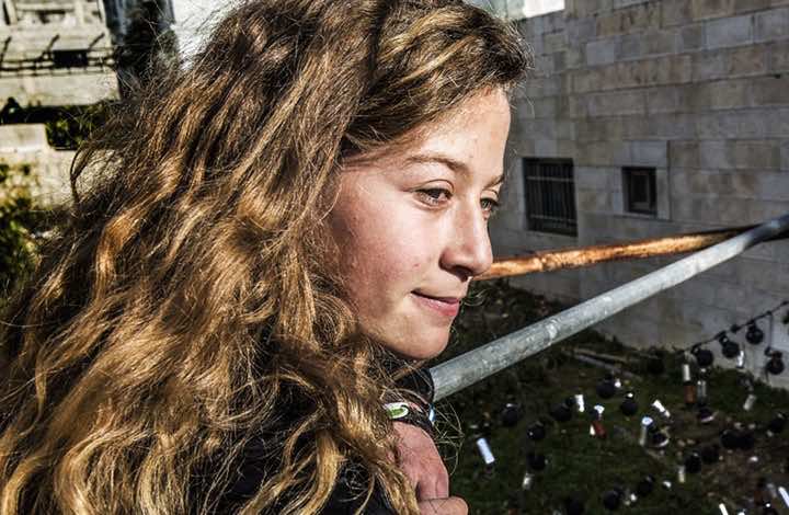 صاحب صورة جيفارا يرسم عهد التميمي - صور