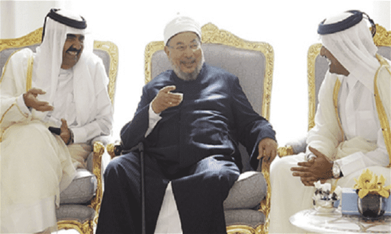 سفير روسي يتهم"القرضاوي" ب "التحكم" في قطر !! -فيديو