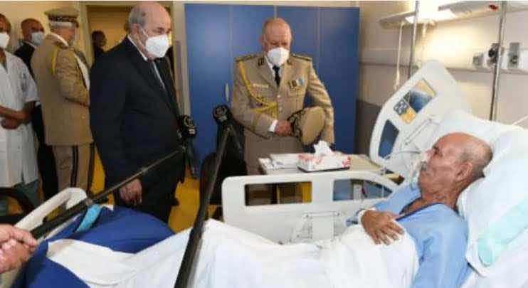 زعيم البوليساريو ممدد على سرير في مستشفى جزائري.. وتبون: "أنت في بلدك"
